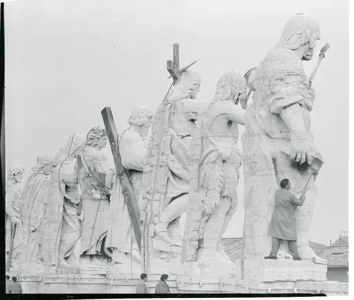 Framed Print : Man Cleaning Apostle Statues