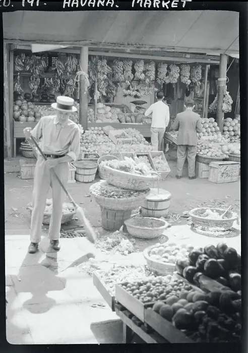 Framed Print : Man Cleaning Market Area