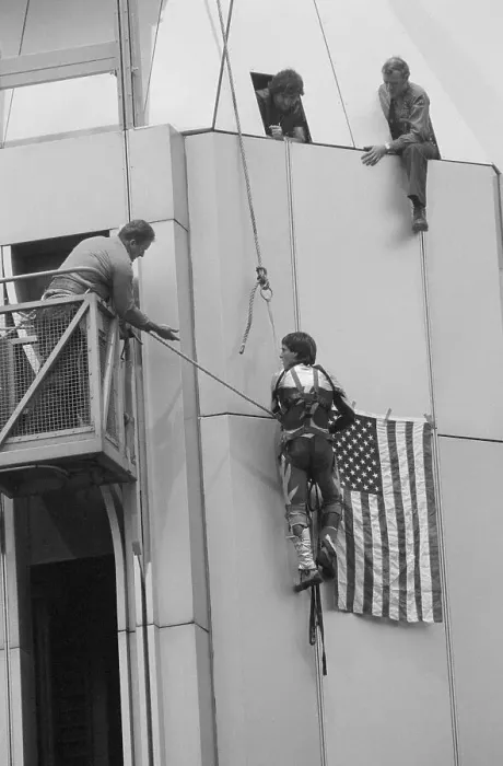 Framed Print : Man Climbing One of the Twin Towers