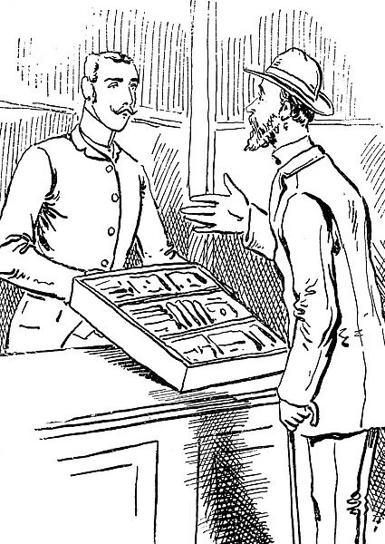 Man in the confectionery department of the department store gets presented the display