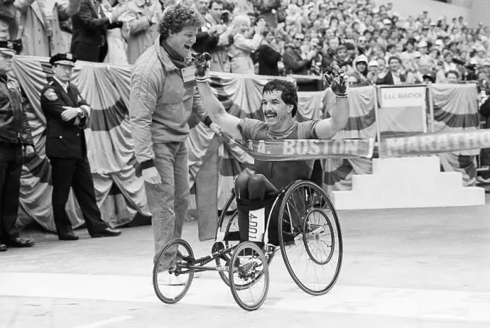 Framed Print : Man Crossing Finish Line In Wheelchair Framed Print : Man Crossing Finish Line In Wheelchair
