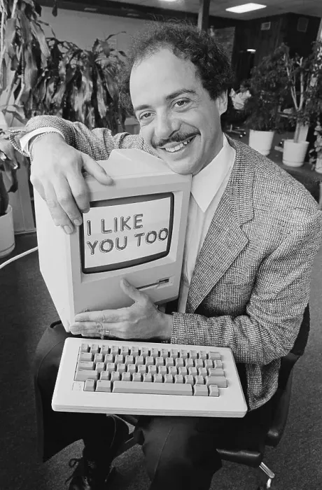 Framed Print : Man Cuddling Friendly Computer Framed Print : Man Cuddling Friendly Computer