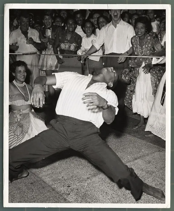 Framed Print : Man Dancing Under Limbo Stick Framed Print : Man Dancing Under Limbo Stick