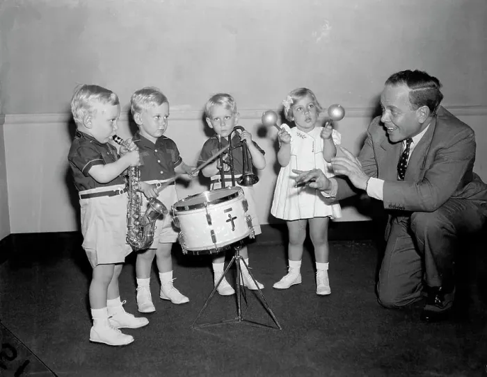 Framed Print : Man Directs Children Playing Instrument Framed Print : Man Directs Children Playing Instrument