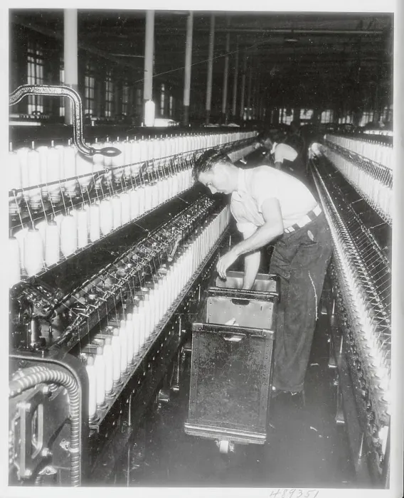 Framed Print : Man Doffing the Spinning Frame Framed Print : Man Doffing the Spinning Frame