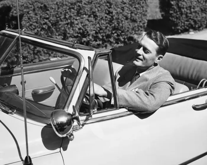 Framed Print : Man driving convertible