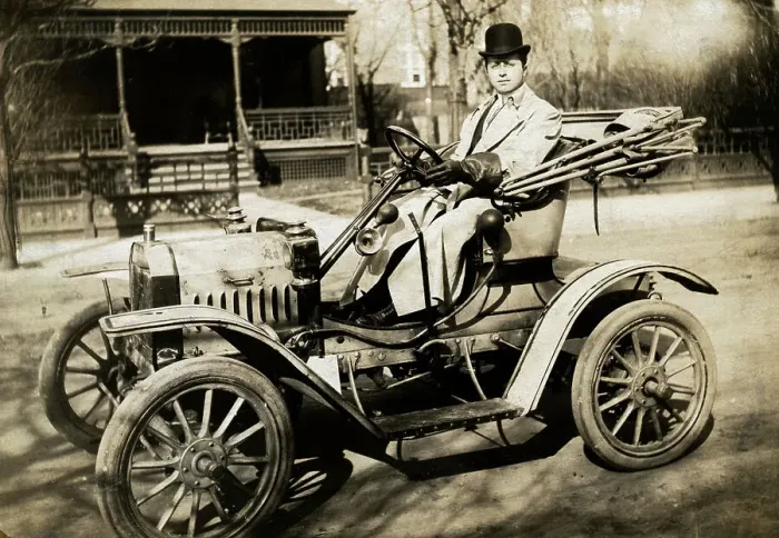 Framed Print : Man Driving One-Cylinder Brush Automobile Framed Print : Man Driving One-Cylinder Brush Automobile