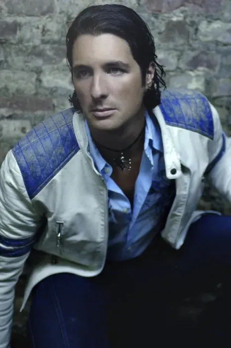 Framed Print : Man, early 30s, wearing a leather jacked in a basement, portrait Framed Print : Man, early 30s, wearing a leather jacked in a basement, portrait