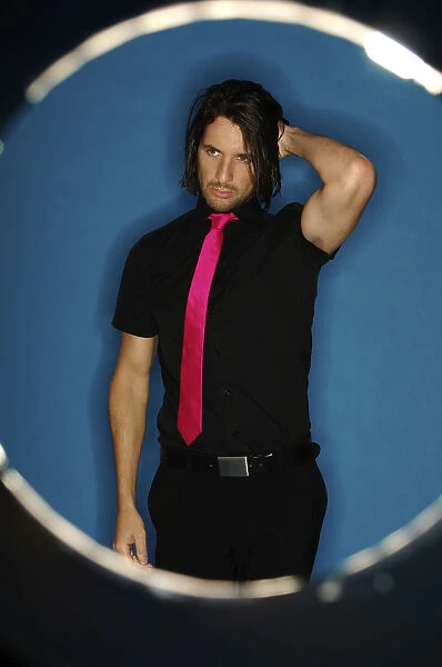 Man, early 30s, wearing party clothes, fashion shot