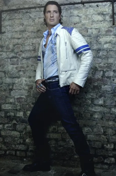 Framed Print : Man in his early thirties, wearing a leather jacket in a basement Framed Print : Man in his early thirties, wearing a leather jacket in a basement