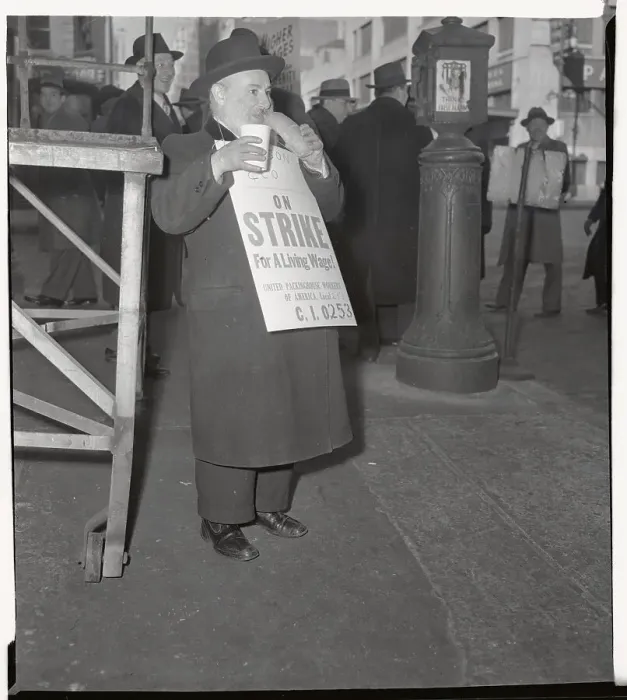 Framed Print : Man Eating Lunch While Picketing Framed Print : Man Eating Lunch While Picketing