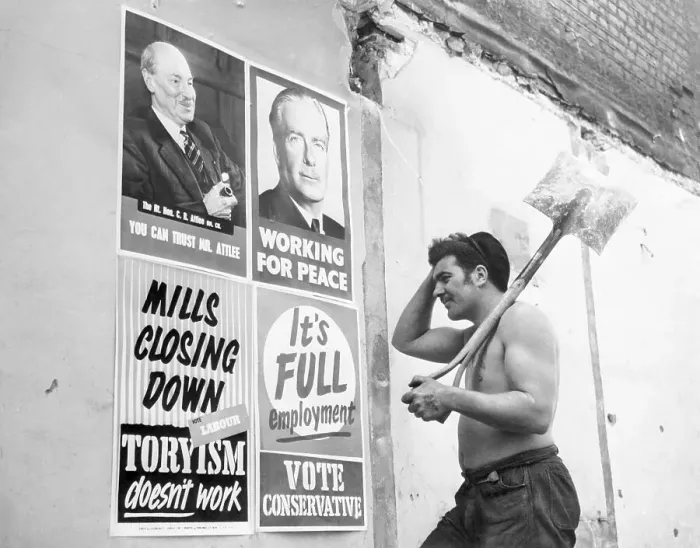 Framed Print : Man Examining British Campaign Posters Framed Print : Man Examining British Campaign Posters