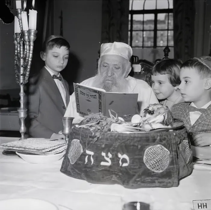 Framed Print : Man Explains Passover Symbolism to Children Framed Print : Man Explains Passover Symbolism to Children
