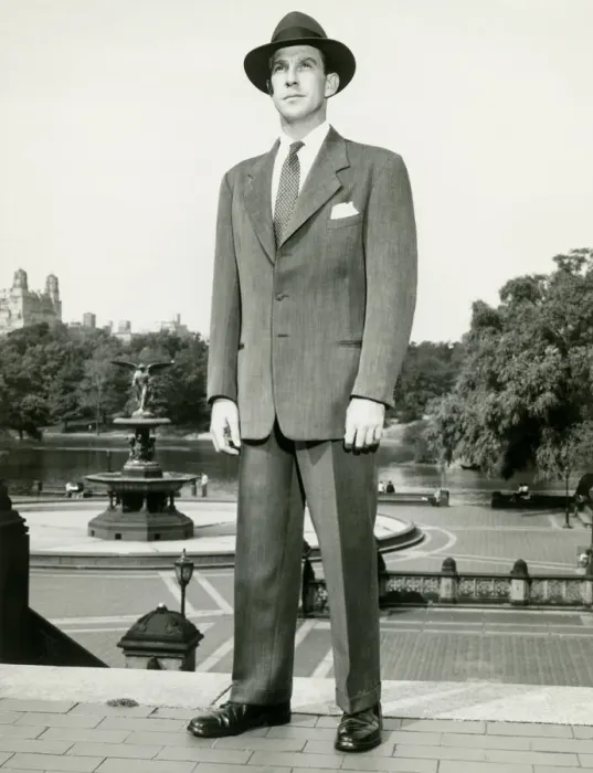 Framed Print : Man in fedora standing on top of steps in park Framed Print : Man in fedora standing on top of steps in park