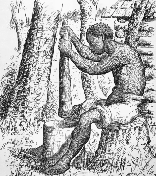 Framed Print : Man Grinding Grain Framed Print : Man Grinding Grain