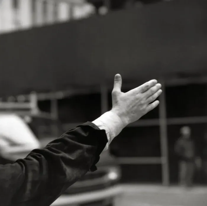 Framed Print : A man hailing a taxi Framed Print : A man hailing a taxi