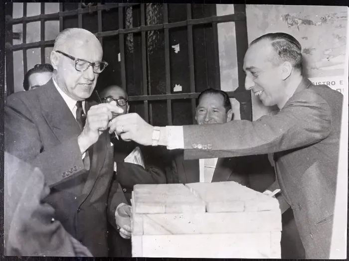 Framed Print : Man Handing Jorge Allessandri a Pencil Framed Print : Man Handing Jorge Allessandri a Pencil