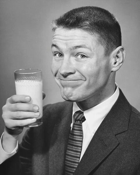 Man having a glass of milk