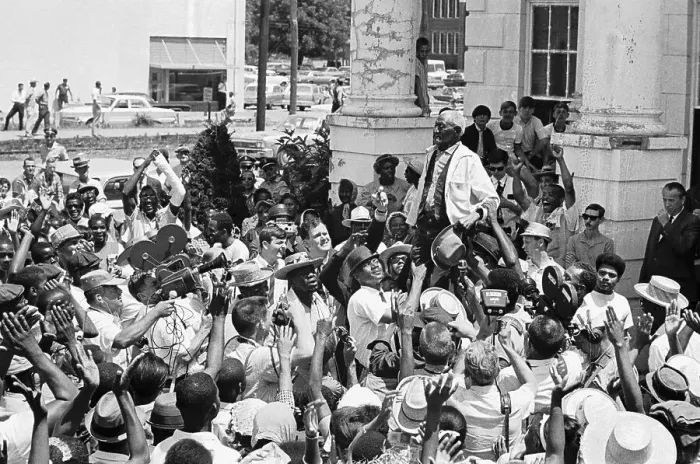 Framed Print : Man Hoisted on Shoulders of Marchers Framed Print : Man Hoisted on Shoulders of Marchers