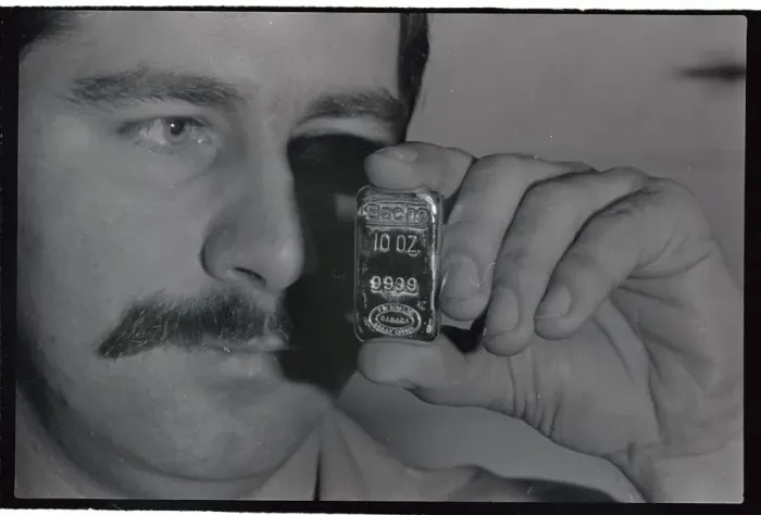 Framed Print : Man Holding Bache Halsey Gold Bar by Face Framed Print : Man Holding Bache Halsey Gold Bar by Face