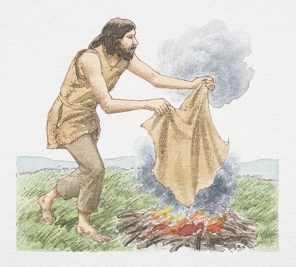 Man holding blanket over open fire to create smoke signals, side view