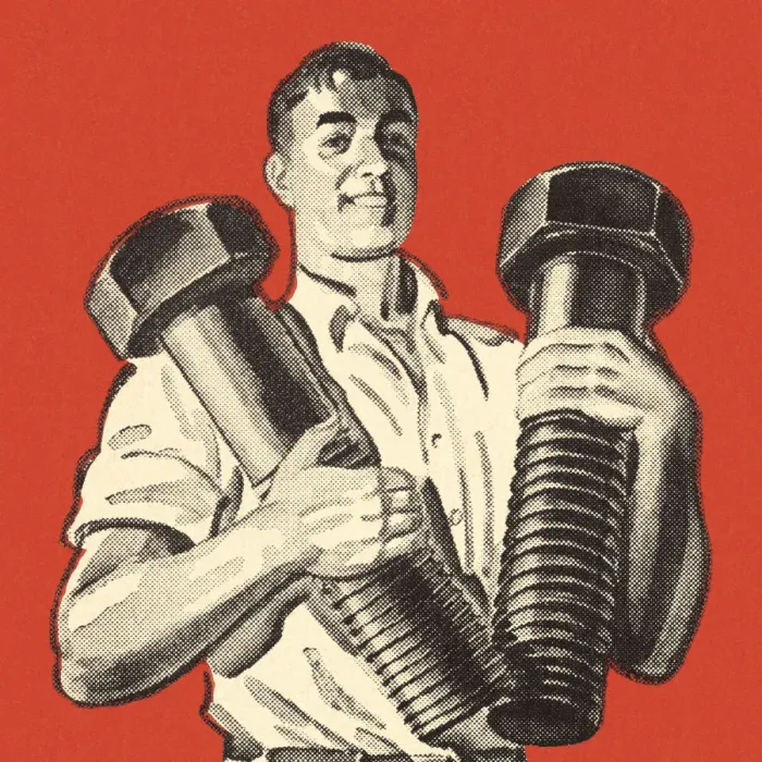 Framed Print : Man Holding Two Giant Bolts Framed Print : Man Holding Two Giant Bolts