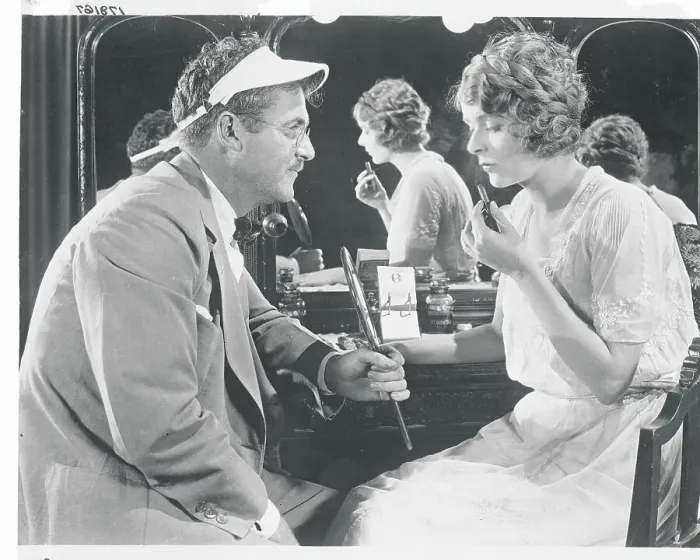 Framed Print : Man Holding Mirror For Actress