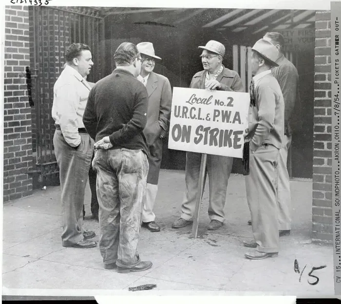 Framed Print : Man Holding Sign in Picket Framed Print : Man Holding Sign in Picket