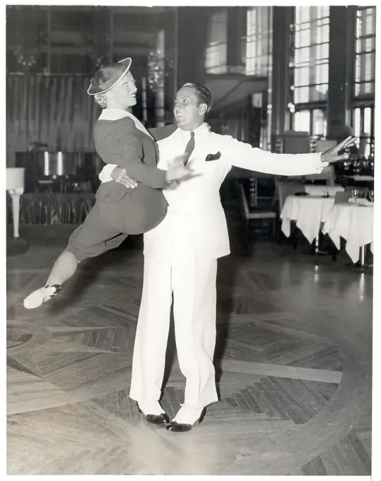 Framed Print : Man Holding Woman in Air Framed Print : Man Holding Woman in Air
