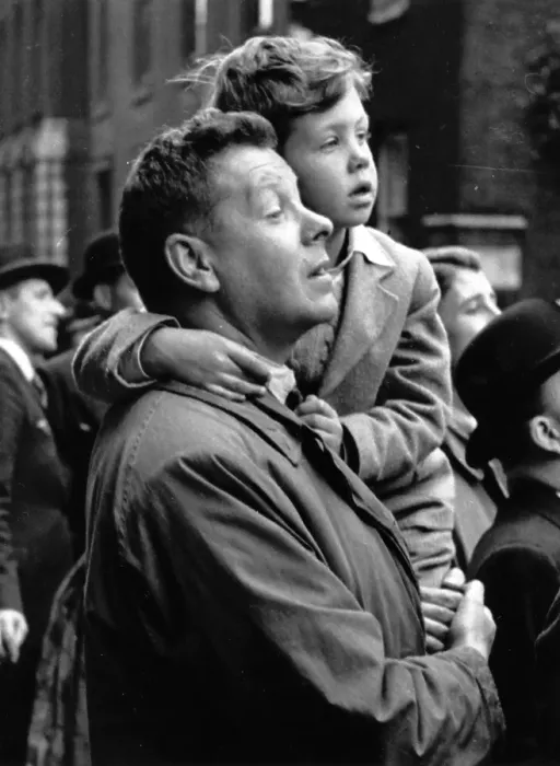 Framed Print : Man Holds Boy