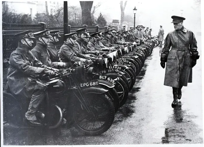 Framed Print : Man Inspecting Motorcycles Framed Print : Man Inspecting Motorcycles