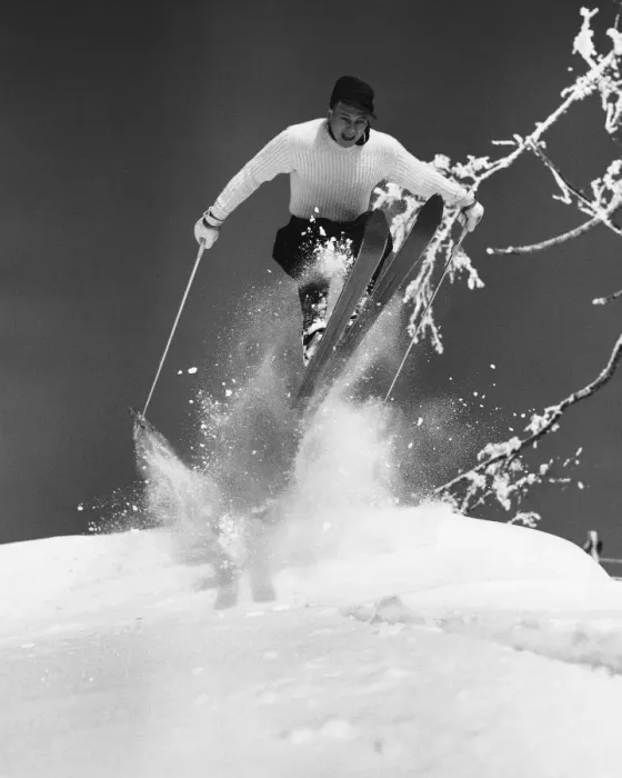 Framed Print : Man jumping through air on skis Framed Print : Man jumping through air on skis