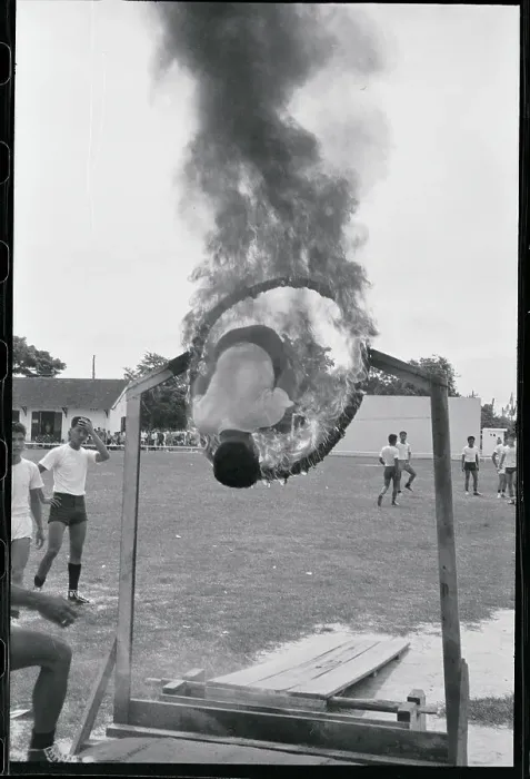 Framed Print : Man Jumping Through Fiery Hoop Framed Print : Man Jumping Through Fiery Hoop