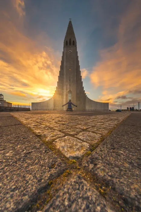 Framed Print : a man kneel down in front of Hallgrimskirkja, Iceland Framed Print : a man kneel down in front of Hallgrimskirkja, Iceland