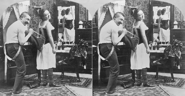 Framed Print : Man Lacing Womans Corset Framed Print : Man Lacing Womans Corset