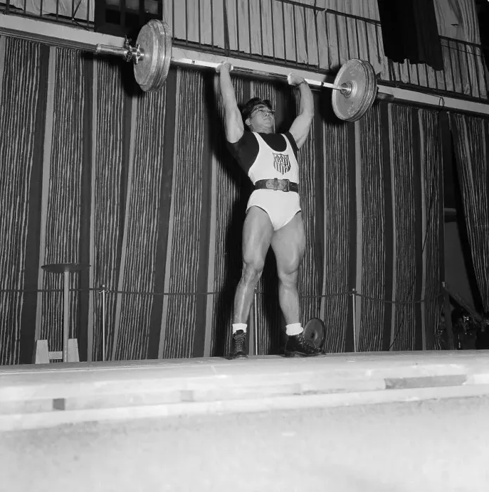 Framed Print : Man Lifting a Barbell Framed Print : Man Lifting a Barbell