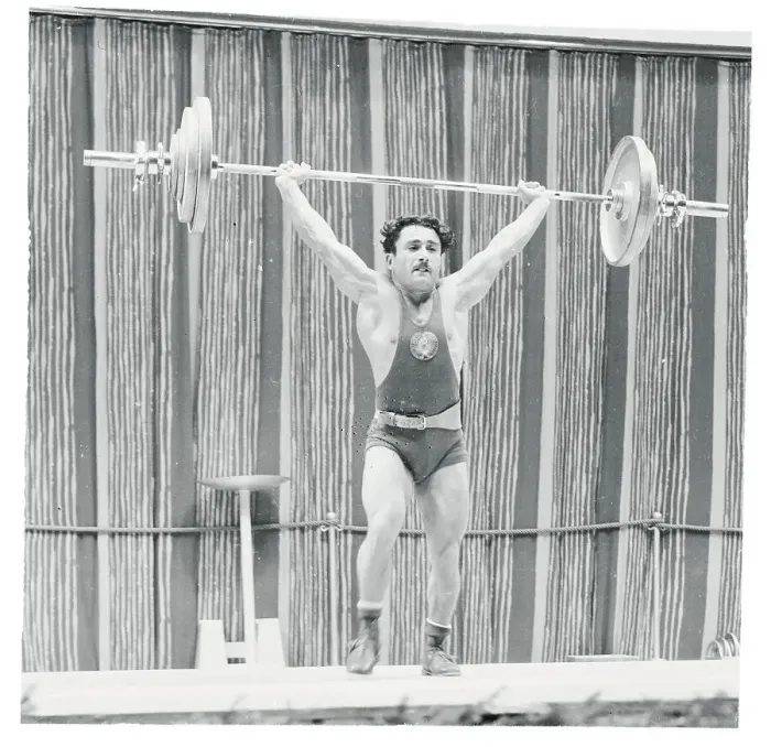 Framed Print : Man Lifting a Barbell Framed Print : Man Lifting a Barbell