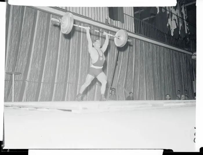 Framed Print : Man Lifting a Barbell Framed Print : Man Lifting a Barbell