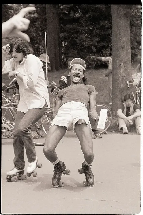 Framed Print : Man Limbos While Roller Skating