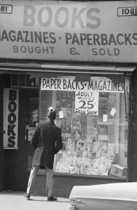 Framed Print : Man Looking Through Bookstore Window Framed Print : Man Looking Through Bookstore Window