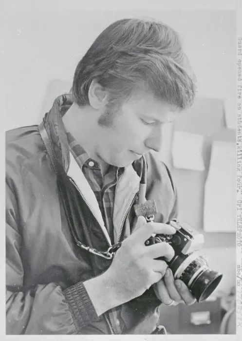 Framed Print : Man Looking at His Camera Framed Print : Man Looking at His Camera