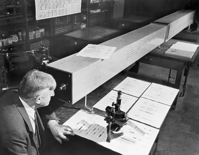 Framed Print : Man Looking Into Eye Piece Of Long Box Framed Print : Man Looking Into Eye Piece Of Long Box
