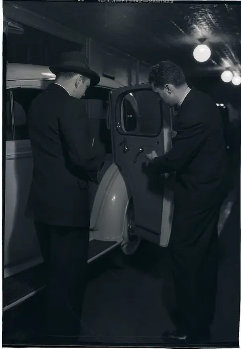 Framed Print : Man Looking at Interior of Car Framed Print : Man Looking at Interior of Car