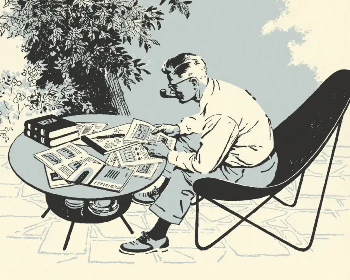 Framed Print : Man Looking Over Papers