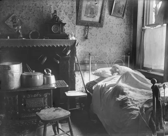 Framed Print : Man Lying in Bed in Tenement House Framed Print : Man Lying in Bed in Tenement House