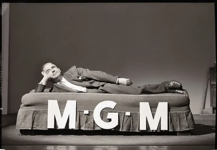 Framed Print : Man Lying on M-G-M Bed Framed Print : Man Lying on M-G-M Bed