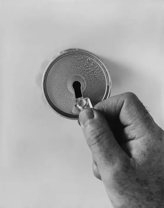 Framed Print : Man opening drinks can, close-up Framed Print : Man opening drinks can, close-up