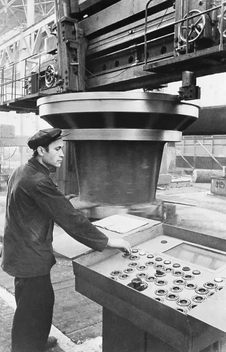 Framed Print : Man Operating Huge Lathe Framed Print : Man Operating Huge Lathe