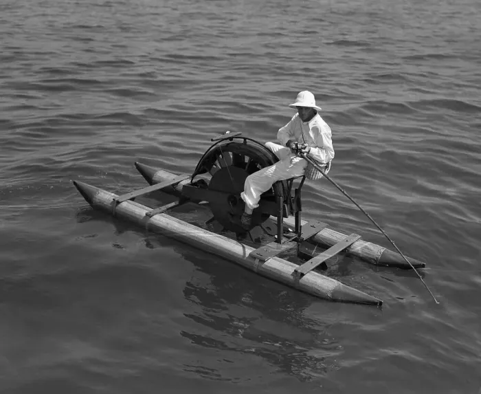 Framed Print : Man on paddleboat fishing Framed Print : Man on paddleboat fishing
