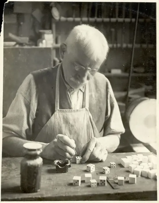 Framed Print : Man Painting Die